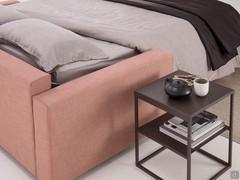 Detail of the open bed with compact arms