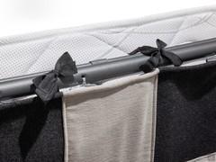 Detail of the net cover that protects the mattress inside when the sofa is closed