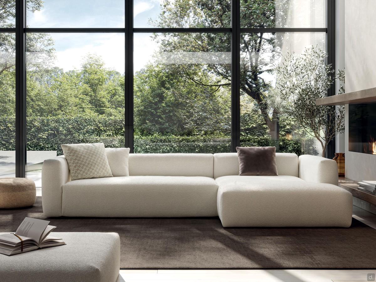 Elvis modern sectional sofa bed, with low back and single deep seat, here proposed with chaise longue