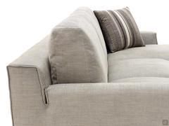 Detail of the backrest joined with the armrest and the soft foam and feather back cushions