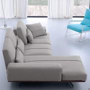 Detail of the sliding backrest on the Axel sofa with chaise longue