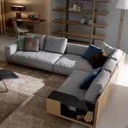 Victor modern luxury sofa with structure covered in leather and cushions in fabric