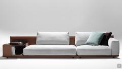 Victor luxury sofa with wide bookcase arm in the MAXI bookcase version that can be used as end table