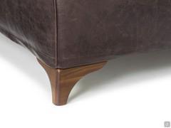 Detail of the foot shaping in walnut-stained beech