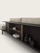 Richmond sofa back view with dark wood bookcase back, Bronze lacquered dividers to match the base and optional Broze lacquered glass shelf