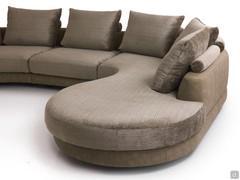 Detail of the meridienne corner piece, which in this case is constructed as a curved, shaped peninsula ending in a wide panoramic seat