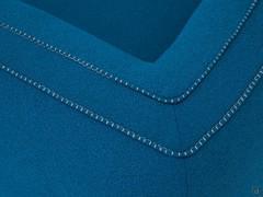Detail of the Step stitching with contrasting thread on the edges of the back and armrests of the Goya sofa