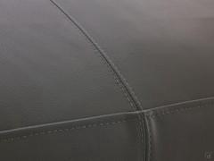 Detail of the Panama leather stitching on the Maxime sofa