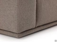 Detail of the upholstered base that appears to be resting on the floor thanks to the very low (h 2.5 cm) and non-visible feet