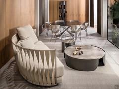 Twist sofa 243 cm wide with comfortable seat 105 cm deep. Enveloping backrest composed of leather or imitation leather bands