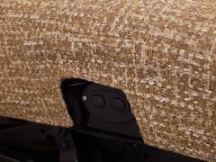 Detail of the button panel on the side of the seat cushion that activates the relaxation mechanism; alternatively, you can choose the wireless remote control
