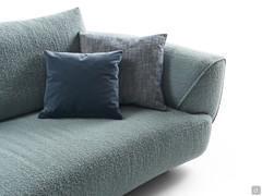 Detail of the shaped armrest that engages the wide rounded seat