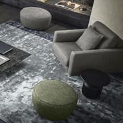 Oakland armchair with optional decorative cushion covered in matching fabric