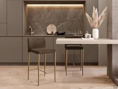  Pair of Depay stools with bronze painted metal frame, a typical use with 'snack' peninsula