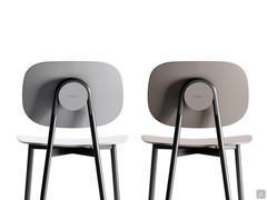 Detail of the painted tubular metal frame that attaches to the backrest
