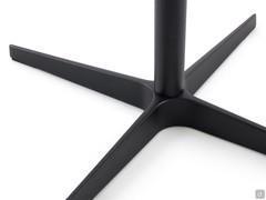 Detail of the black painted metal spoked base
