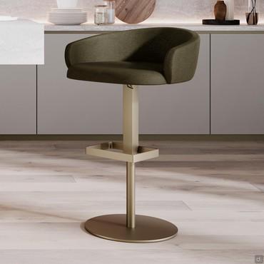 Diane bar stool with low backrest and adjustable height.