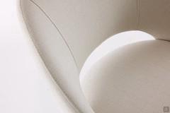 Detail of the Niva stool seat, upholstered in Joint col.401 Corda