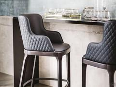 Magda stool by Cattelan in the model with armrests and quilted backrest