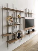 Wall-mounted TV stand with shelves Waterfall, also offered here accompanied by the bookcase module.