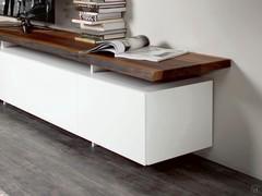 Detail of the NC walnut wood top and matt white lacquered base