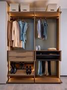 Double Bay Wide module equipped with pull-out accessories, drawers and shoe shelf, as well as elegant vertical LED lights on the sides