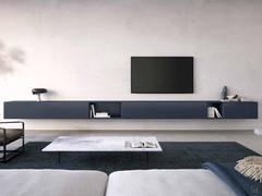 Wall system with a minimalist design and Royal base units in matt lacquer (Ocean finish)