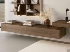 A composition of base units with drop-down doors and drawers - aged oak wood in the E25 Tobacco finish.