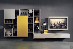 Park 02 is a suspended living room wall system with container shelves with open or closed wall units, container base with drawers, orientable TV panel - (finitura laccato opaco giallo non disponibile)