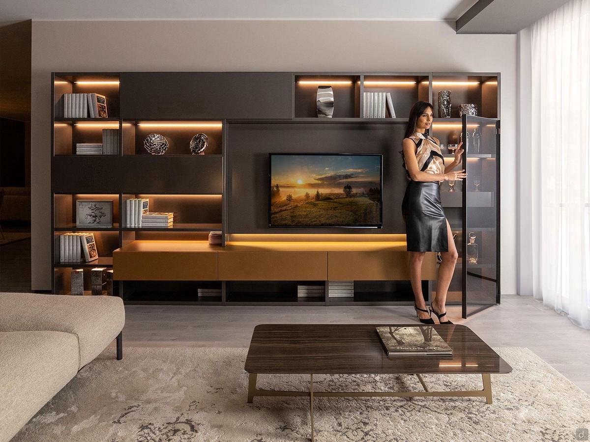 Way 27 illuminated wall unit with drop-down doors, open compartments and suspended base units