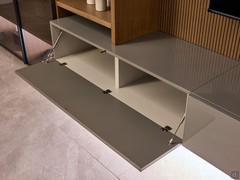 Suspended base unit with drop-down door