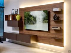 Freehand 12 wall-mounted wall panelling with wall-mounted TV, metal shelves and wall-mounted drop-down and drawer units