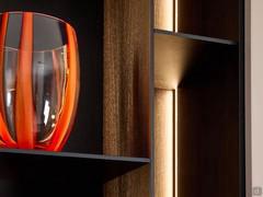 Detail of the Patchwork bookcase, with shelves and slim partitions in oak veneer E26 Carbon