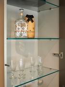 Side column of Plan 40 wall unit, complete with glass shelves