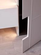 Detail of the door recess with the 'cantilever' front specially created to allow it to be opened even with suspended base units