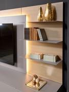 View of the three slender shelves in silica matte lacquered metal matching the base units and TV panel