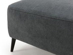 Détail du revêtement en tissu du pouf Abbey
