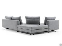 Elément de pouf d'angle équipé d'un coussin avec système à cliquet. Cela permet de créer un siège supplémentaire confortable "dynamique dans le positionnement".