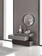 Commode réalisée en superposant partiellement trois tiroirs simples de la collection Philadelphia Tiroirs en trois différentes teintes de gris laqué mat