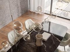 Les deux modèles de lampes Bloom, aux formes complémentaires et aux finitions assorties, équilibrent l'ensemble de la composition