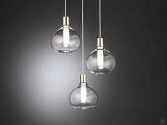 Lampe suspendue Tetide avec trois diffuseurs en verre Pyrex, dans le modèle circulaire convenant aux tables rondes ou aux tables basses