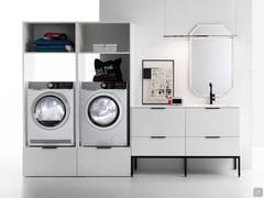 Meuble de buanderie avec lavabo pour lave-linge et sèche-linge, complété par un miroir polygonal