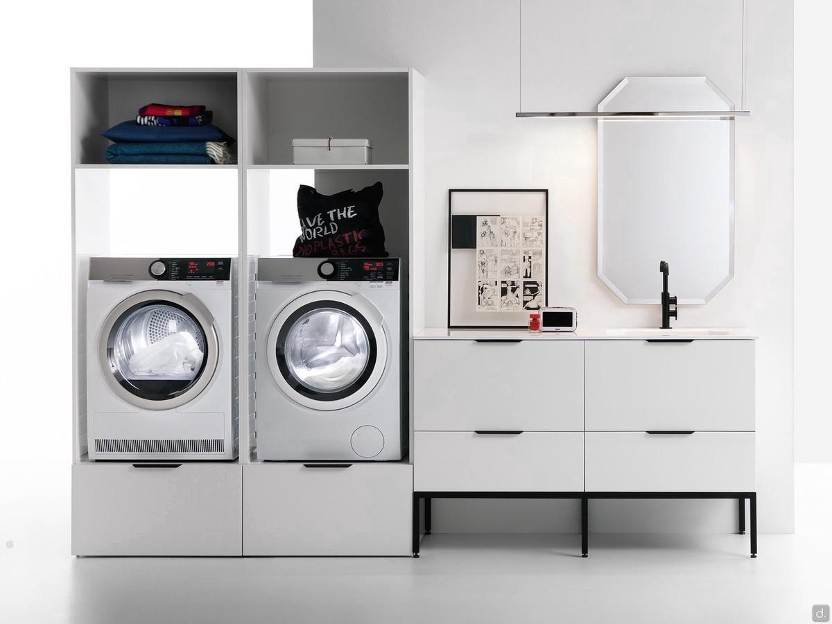 Meuble de buanderie avec lavabo pour lave-linge et sèche-linge, complété par un miroir polygonal