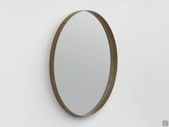 Miroir rond Tema dans la version avec cadre fin en métal bronzé