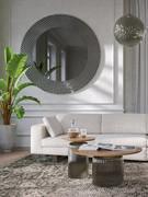 Exemple du miroir Talete en finition fumé placé dans une ambiance salon ou salle à manger