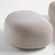 Scoop upholstered fabric ottoman