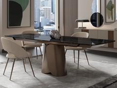 Table Miles en céramique polie noir desir, en version extensible avec double rallonge latérale assortie au plateau