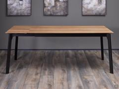 Table Basil 160 cm, photographiée avec la rallonge de 40 cm retirée et placée à l'extrémité du plateau