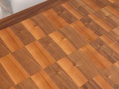 Détail du plateau en noyer avec la marqueterie décorative spéciale qui caractérise son design