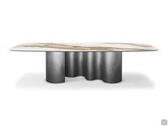 Table Papel de Cattelan avec plateau tonneau en pierre Keramik, également disponible en version rectangulaire, tonneau ou polygonale.